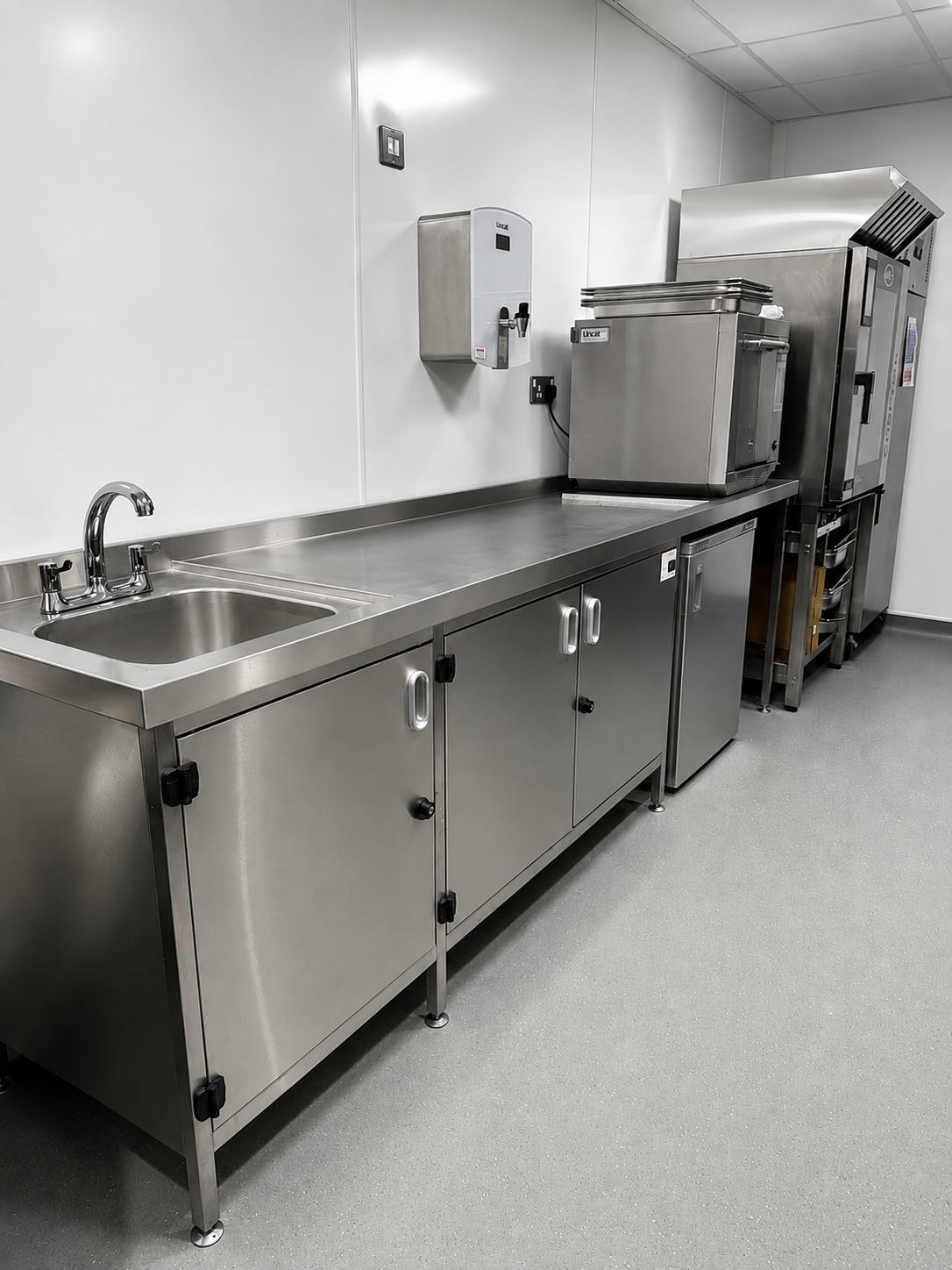 Heanor Gate Spencer Academy — new stainless steel prep bench with under-counter storage, Lincat water boiler and combination oven