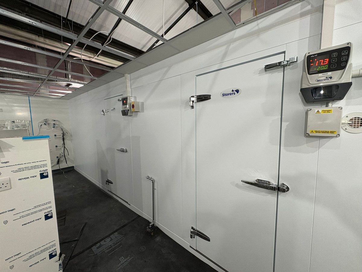 Twin Storers walk-in freezer and cold room units installed side by side with Eliwell temperature controllers