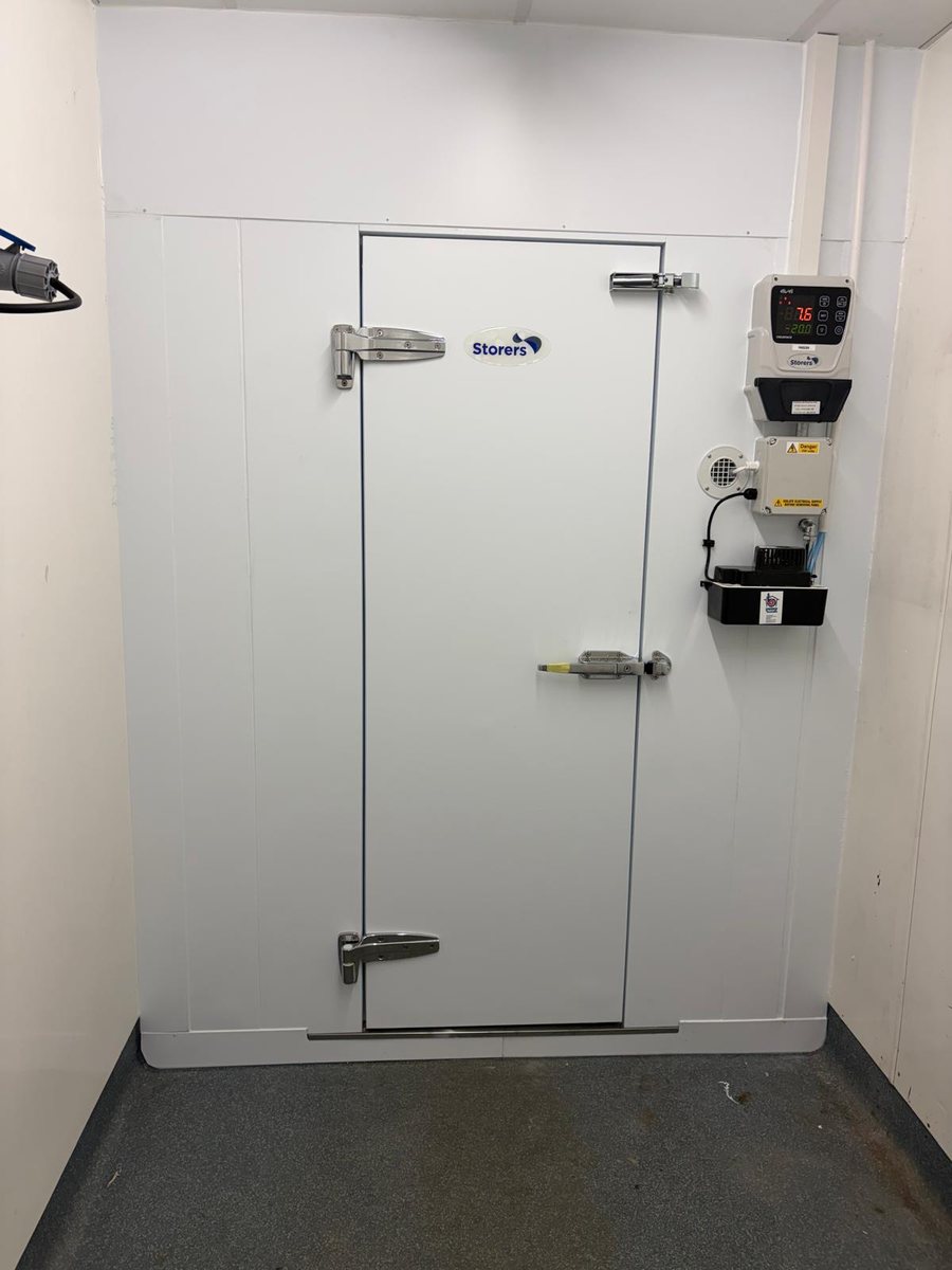 Walk-in freezer door with Eliwell Coldface controller showing minus twenty degrees, installed by Castle Catering Engineers